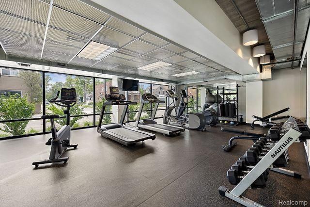 gym featuring expansive windows