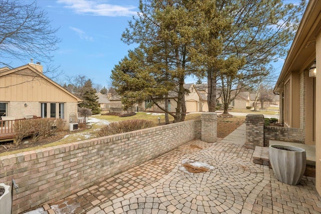 view of patio with a residential view