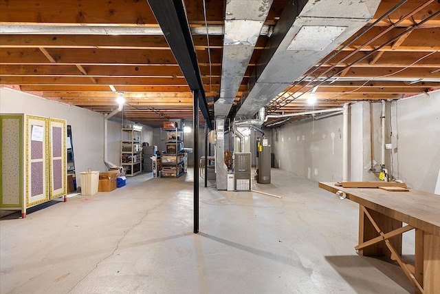 unfinished basement with water heater