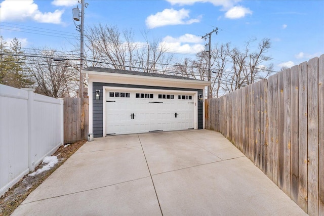 detached garage with fence