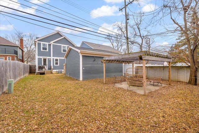 view of yard featuring a fenced backyard, a patio, and a pergola