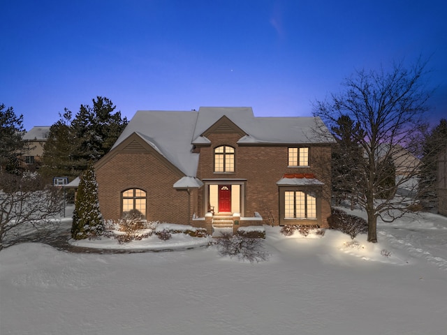 view of front of property featuring brick siding