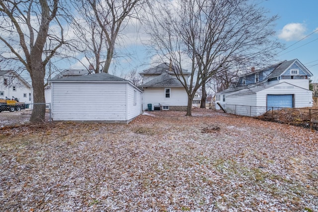 view of yard featuring an outdoor structure and fence