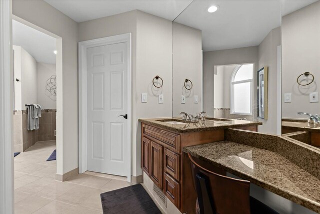 full bath featuring tile patterned flooring and vanity