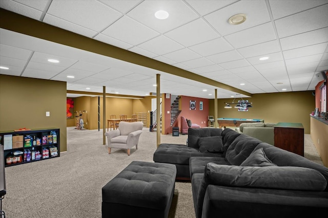 living area featuring stairs, carpet flooring, a paneled ceiling, and recessed lighting