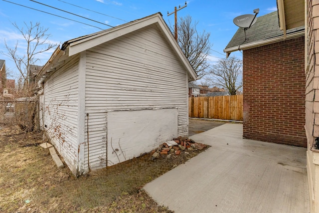 garage with fence