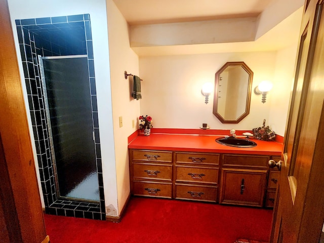 bathroom featuring a stall shower and vanity