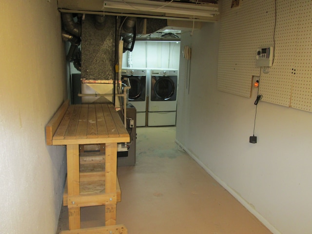 unfinished basement with separate washer and dryer