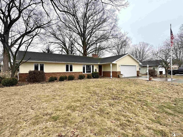 ranch-style house with concrete driveway, brick siding, a chimney, and an attached garage