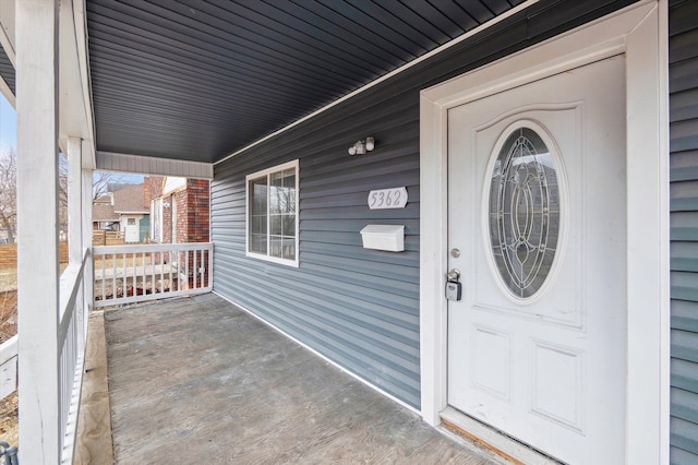 entrance to property with a porch