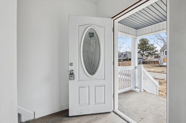 entrance foyer featuring baseboards