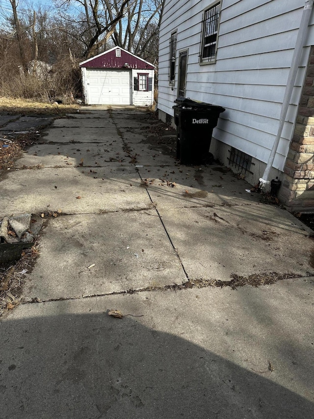 exterior space featuring concrete driveway