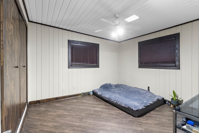 bedroom featuring ceiling fan and wood finished floors