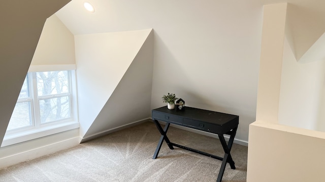 carpeted office space with lofted ceiling, recessed lighting, and baseboards