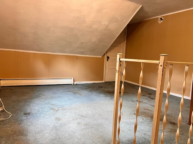 bonus room with lofted ceiling and baseboard heating