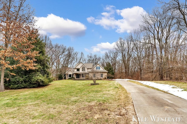 view of front of property with stone siding and a front yard