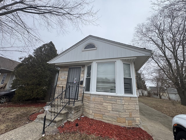 view of front of home with stone siding