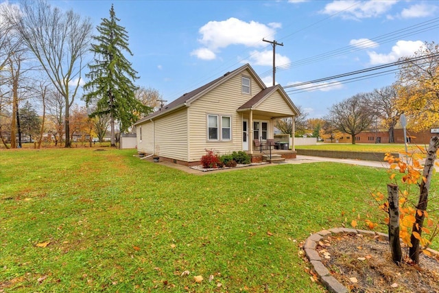 view of property exterior featuring a yard