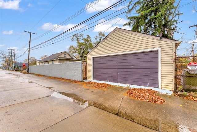 detached garage with fence