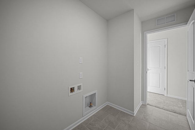 clothes washing area with laundry area, baseboards, visible vents, carpet flooring, and washer hookup