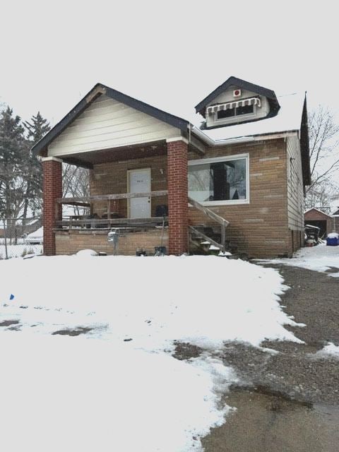 view of front of property with brick siding