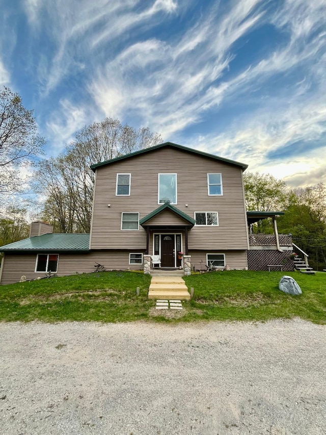 8555 11th Mile, Evart, MI 49631 - view of front of property featuring a front lawn