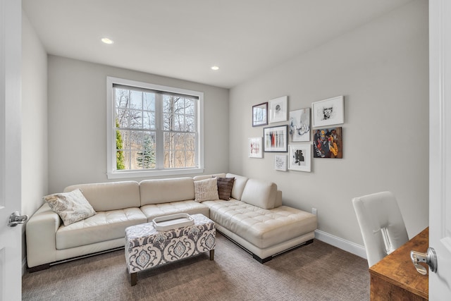 carpeted living room with recessed lighting and baseboards