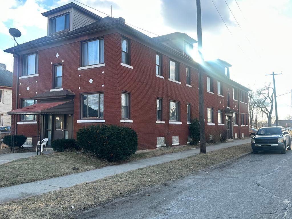 view of home's exterior featuring brick siding