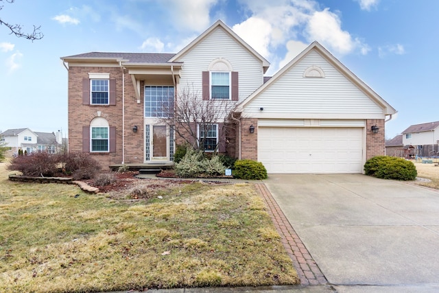 traditional home featuring a garage, concrete driveway, brick siding, and a front yard