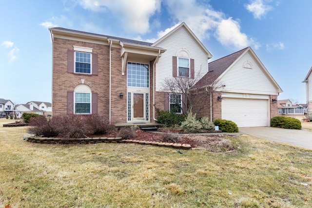 traditional-style home featuring a garage, brick siding, driveway, and a front lawn