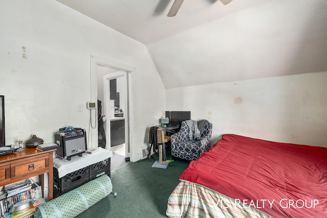 carpeted bedroom featuring a ceiling fan and vaulted ceiling