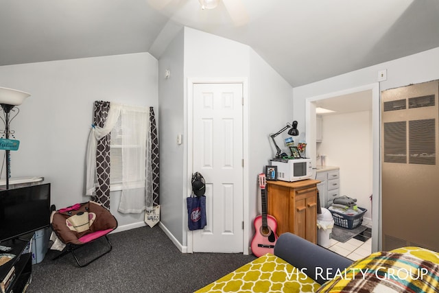 carpeted bedroom with lofted ceiling, a heating unit, a ceiling fan, and baseboards