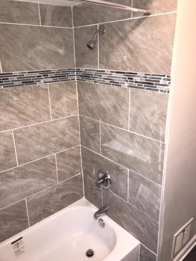 full bathroom featuring washtub / shower combination