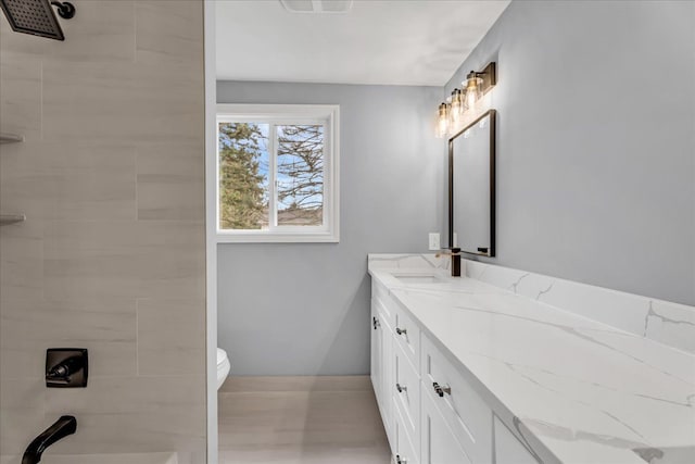 bathroom featuring toilet, visible vents, walk in shower, and vanity