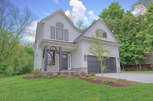 view of front facade featuring a garage, concrete driveway, stone siding, board and batten siding, and a front yard