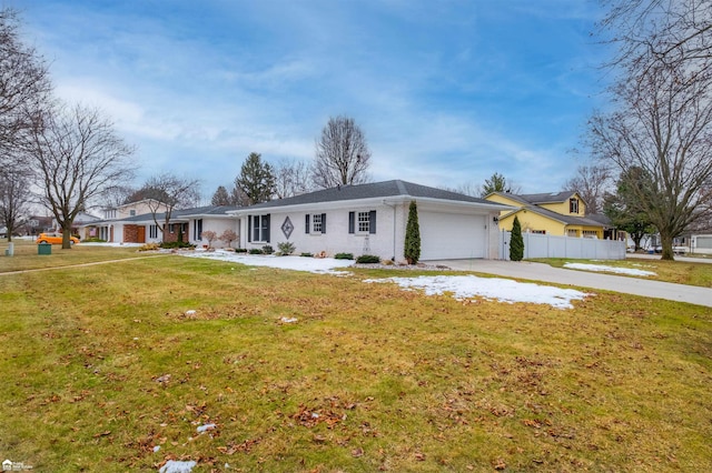 single story home featuring a garage, brick siding, fence, driveway, and a front lawn