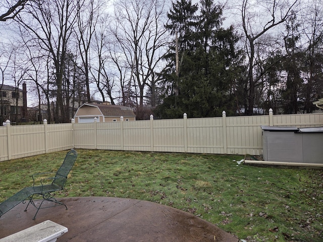 view of yard featuring a patio area and a fenced backyard