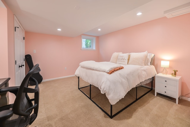 bedroom with recessed lighting, baseboards, and light carpet