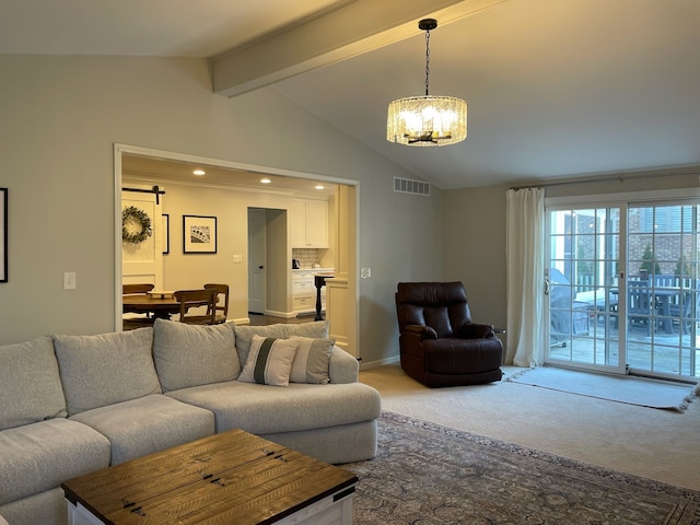 living area featuring baseboards, visible vents, lofted ceiling with beams, carpet flooring, and a chandelier