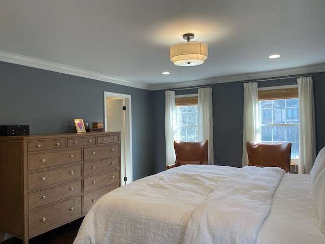 bedroom featuring crown molding and recessed lighting