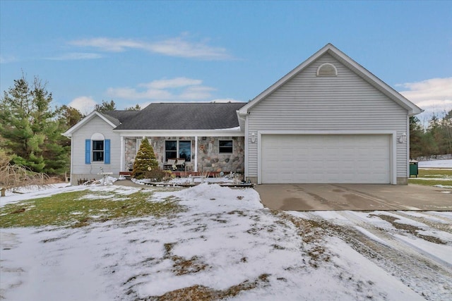 ranch-style house with stone siding, concrete driveway, and an attached garage