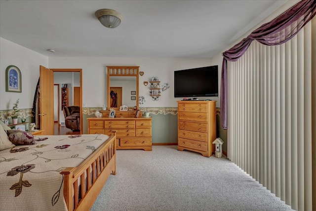 bedroom with light carpet