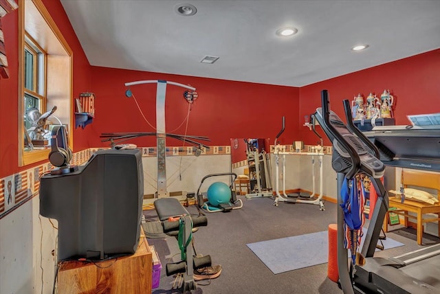 exercise room featuring recessed lighting and visible vents