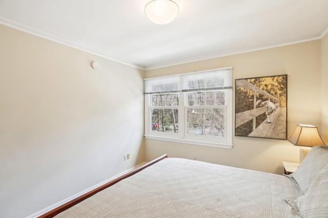 unfurnished bedroom featuring ornamental molding and baseboards