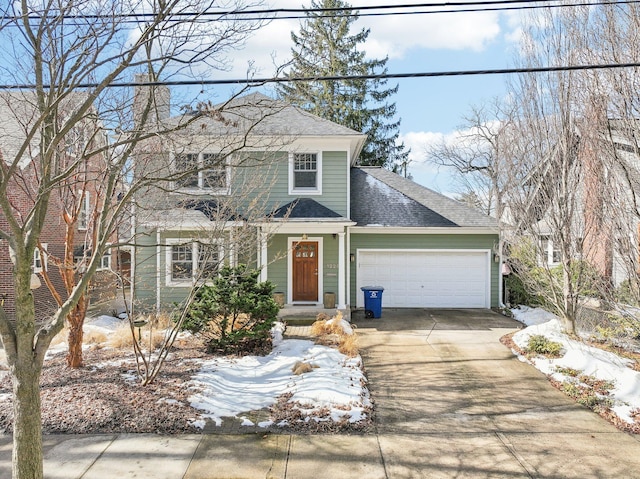 view of front facade featuring an attached garage, driveway, a chimney, and a shingled roof