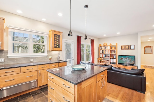 kitchen with recessed lighting, tasteful backsplash, a sink, and a warming drawer