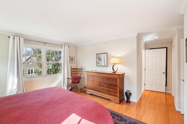 bedroom with light wood-style floors, recessed lighting, baseboards, and ornamental molding