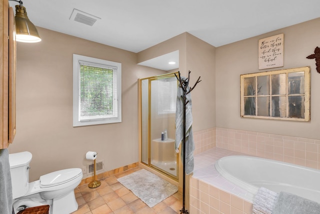 full bathroom with toilet, a stall shower, visible vents, and a bath