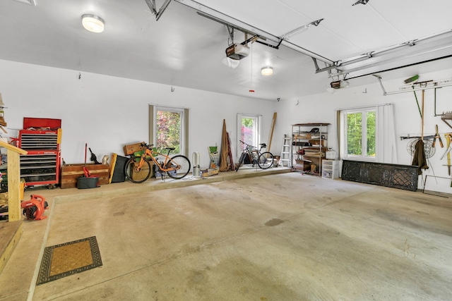 garage featuring a garage door opener