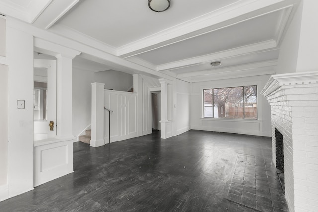 unfurnished living room with stairs, dark wood-style flooring, ornamental molding, and beamed ceiling